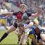 Chad Randall and Luke Williamson get to grips with Lee Briers