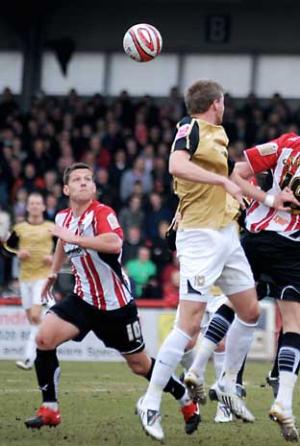 Man-of-the-match Charlie MacDonald keeps his eye on the ball. Deadlinepix Chris Gray CG1324