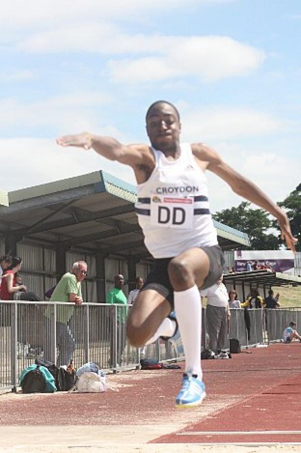 Sheldon Brown leaps to a long jump win. Mike Fleet