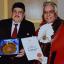 Hajee Mubarik Ali (left) receiving his Mayor's Community award from Councillor Shiraz Mirza