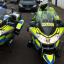 Police motorbikes flanked the funeral procession as a mark of respect