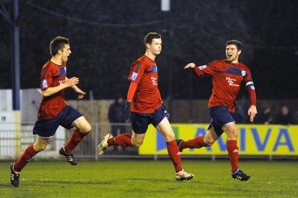 Shoot on sight: Hampton's Reece Jones celebrates opening the scoring in Tuesday's 2-2 draw with Dover Athletic at the Beveree