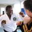 VIDEO: A pensioner who knows how to pack a punch has achieved the remarkable feat of gaining a black belt in martial arts.