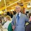   A singing 76-year-old has been serenading supermarket shoppers in Sutton.