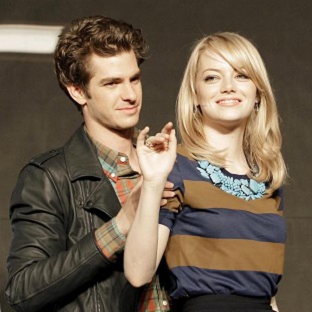 Andrew Garfield, left, and Emma Stone are the stars of The Amazing Spider-Man (AP)