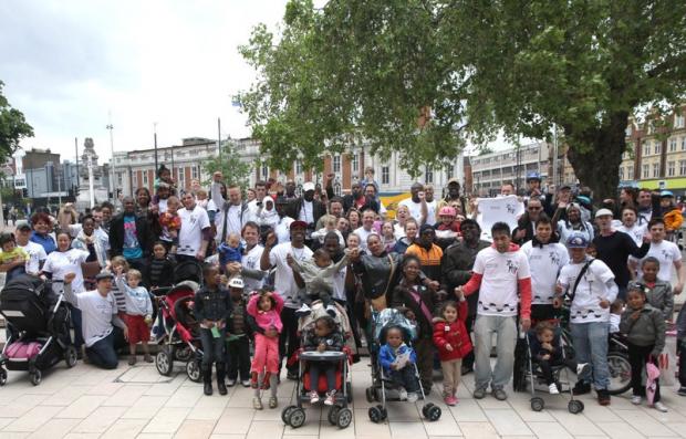 One hundred fathers took their children on a march from Brixton to Brockwell park.