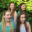 Four young actors playing the Alice in different performances - Chrissy Armitage, Freya Clarke, Vicky Hillman and Nina Ridge.