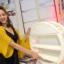 Bethany Hawker with a cabinet she made