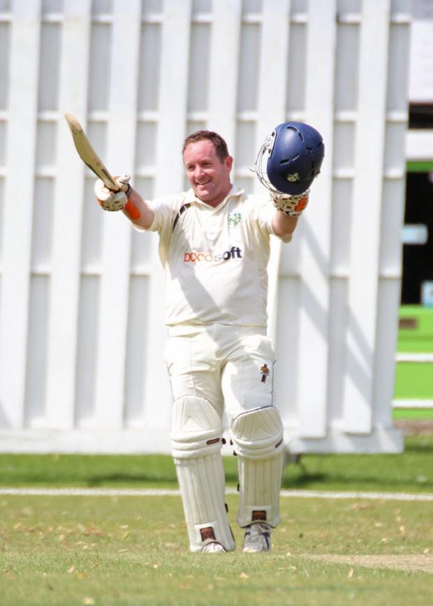 Smile like you Green it: Twickenham batsman Jean-Pierre Cronje celebrates reaching his 100 in the Green on Saturday