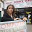 Mussarat Umer outside her store that has closed since the riots.