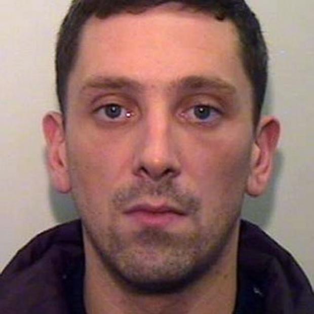 Police are hunting Anthony Morrison, who fled from Manchester Airport