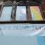 Community mural created in burnt-out fancy dress shop