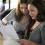 Dunraven students look at GCSE results.