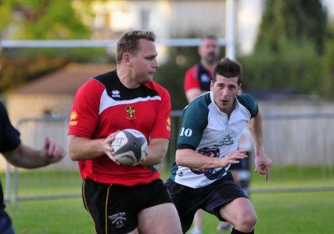 Sutton &amp; Epsom forwards coach Shawn Renwick, formerly of National Division One Esher, gets involved in training last week
