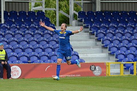 On song: Jack Midson celebrates his goal for the Dons against Dagenham &amp; Redbridge     SP68704