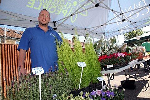 John Kitching, from Tomorrow's People Trust, with flower stall