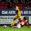 Rhoys Wiggins slides in on Wilfried Zaha