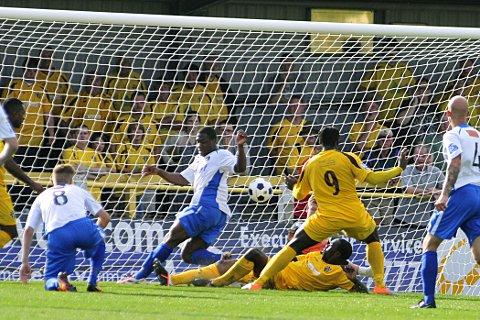 Leveller: Sutton's Craig Dundas scores the equaliser in Saturday's 1-1 draw with Havant & Waterlooville