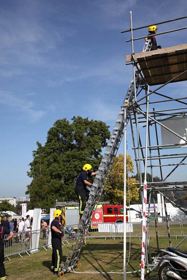 Firefighters climb at the Lambeth Country Show