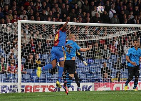 Kagisho Dikgacoi's looping header puts Palace in front
