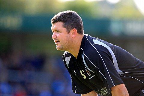 AFC Wimbledon's caretaker manager Simon Bassey