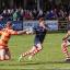 Get out the way: Matt Heeks charges through the Cambridge lines on his way to scoring, as Steve Hamilton (right) looks on                      David Whittam