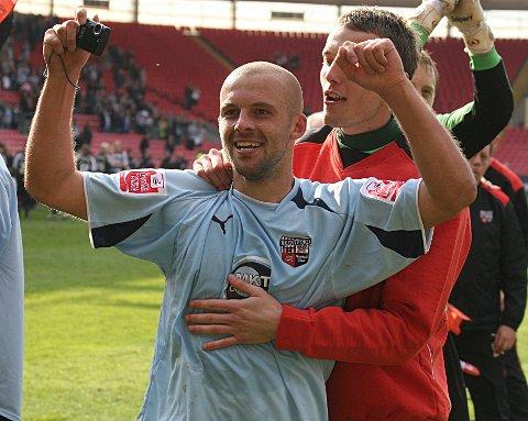 Happy days: David Hunt celebrates winning the League Two title with Brentford in 2009