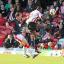 First to the ball: Clayton Donaldson flicks the ball past Crawley keeper Paul Jones for Saturday's winner