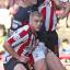 Tight liek a Tiger: Tony Craig and Jake Bidwell kept Gary Alexander on a tight reign on Saturday