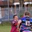 Full force: Wes Baron tries to barge his way through the Old Tonbridgians' defence