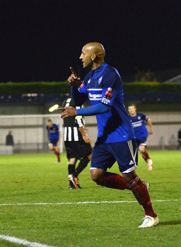 Going through: Met Police's Tyron Smith celebrates his late goal that confirmed the Blues their spot in the FA Cup fourth qualifying round