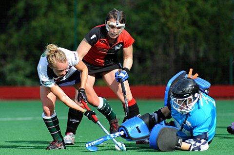 Thwarted: Surbiton's Vicky Bryant is stopped in her tracks by the Bowdon Hightown goalkeeper on Saturday