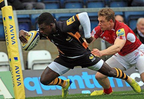 Speed demon: London Wasps winger Christian Wade scores in the corner during his side's 29-19 win over London Welsh at Adams Park on Sunday
