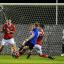 Sweating: Allan Tait lets fly on Tuesday night but he will be sweating on a spot in Saturday's FA Cup clash
