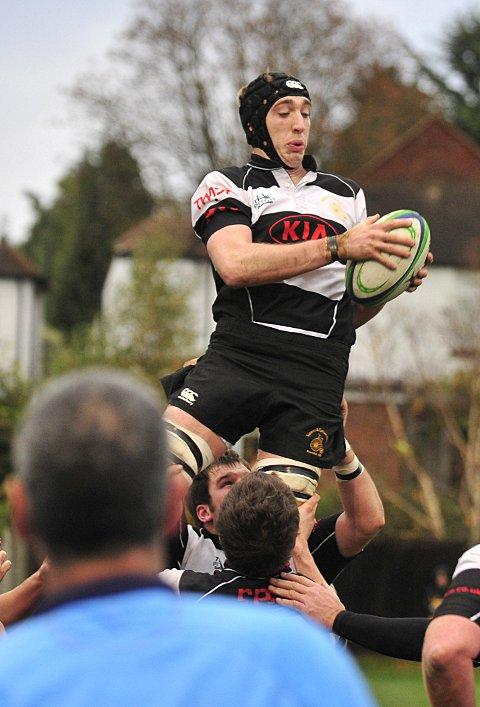 High above: James Caddy rises above the melee but it was the only high point of the KCS defeat