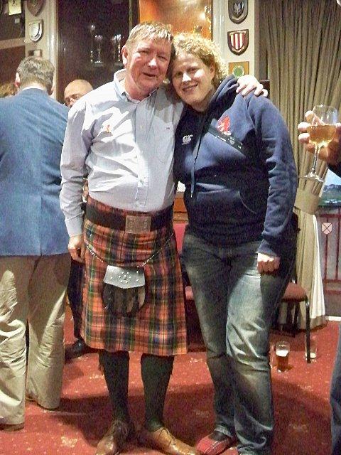 Partners in crime: Scottish fan Sandy Clark and his partner Jane Innes
