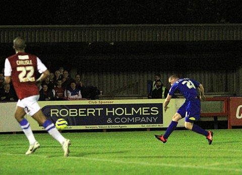 On the way: Charlie Strutton fires the opening goal against York City that eventually set up the FA Cup meeting with MK Dons SP71719