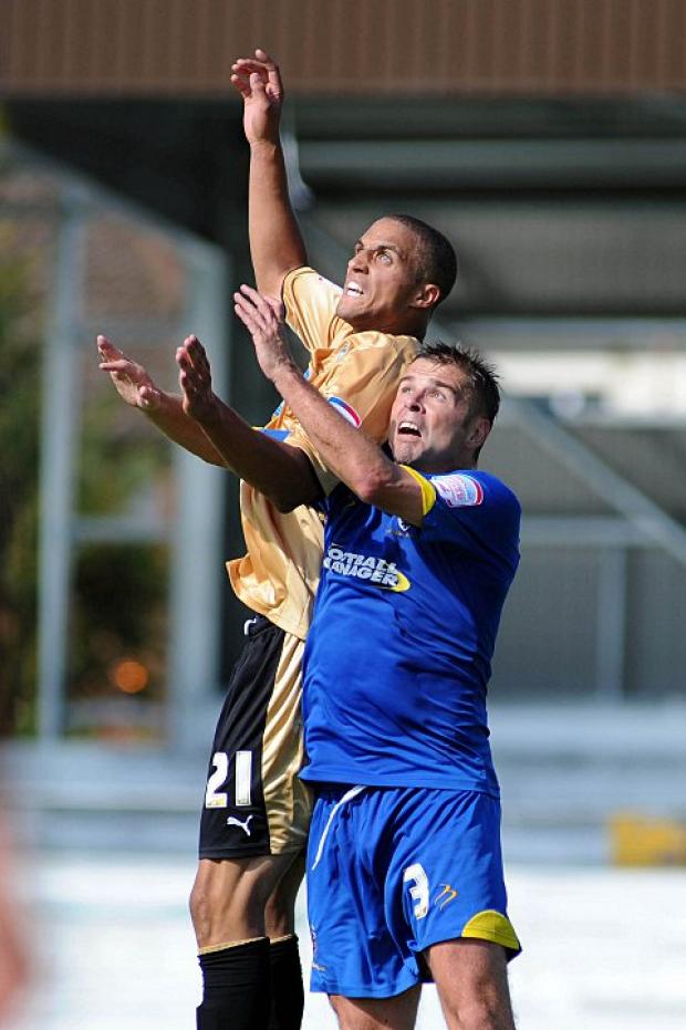 Up for the shots: Cummings is preparing himself for a dog-fight against Aldershot WI69689