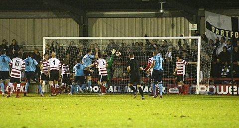Straw that broke the camel’s back: Dartford’s Elliot Bradbrook connects with a header to score the sort of goal at the weekend that has been driving boss Alan Dowson to distraction 	Deadlinepix SP70845