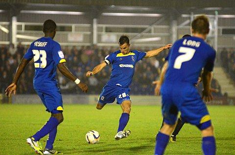 On the ball: Loanee Steven Gregory has helped to bolster the Dons midfield and he is hoping to return in January for another prolonged stay    KT71306