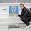 Ticket amnesty: Dons boss Neal Ardley drops his ticket in the box, but of course he does not need one anyway