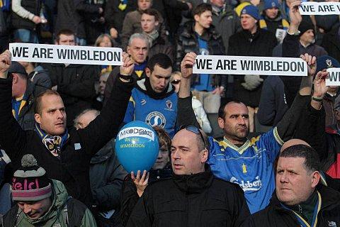 Streatham Guardian: Dons fans state their case during the FA Cup defeat at Stadium MK in 2013. Picture: MK Citizen Streatham Guardian: Dons fans state their case during the FA Cup defeat at Stadium MK in 2013. Picture: MK Citizen