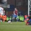 Grounded: Mile Jedinak finds himself on the turf during the 2-2 draw with Blackpool     SP70859