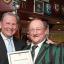 Seal of approval: Andrew Cosslett presents former Weybridge Vandals junior chairman John Sillwood with the RFU Clubmark accreditation