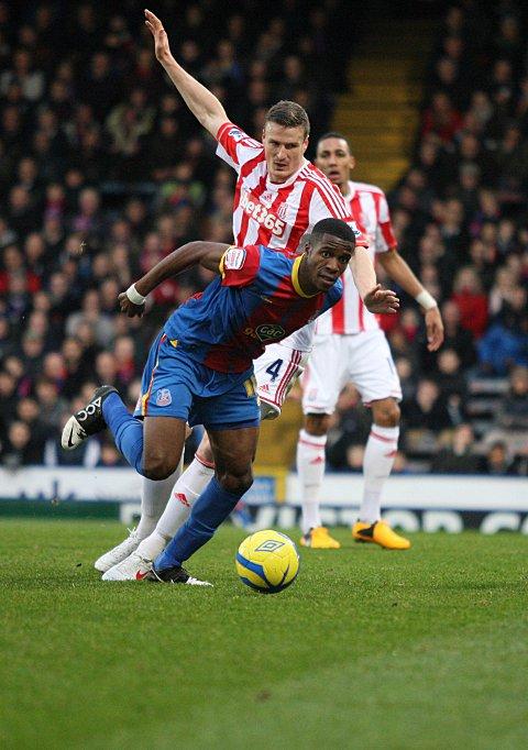 Problem man: Wilfried Zaha caused Stoke's defence, including Robert Huth, all manner of problems but he could not find a way past        SP72883