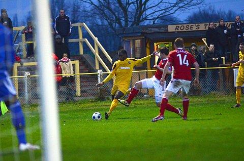 Have a go: Craig Dundas tries his luck in the 5-0 FA Trophy defeat to Wrexham    SP72782