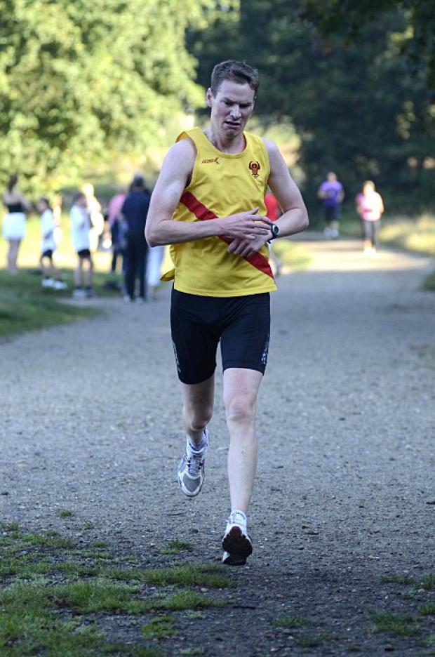 On the run: Phil Glynn in action for Wimbledon Hercules AC