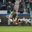 Comeback: Fit-again centre George Lowe touches down fly half Nick Evans' grubber kick