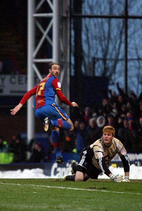 Offside: Glenn Murray looks to the linesman in hope after slotting the ball past Adam Bogdan, but it was a forlorn hope     SP72943