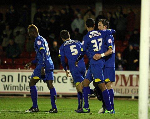 I've scored a goal: Jack Midson is congratulated by his team-mates after bagging a second goal in Thursday night's 2-2 draw with Port Vale   SP73498